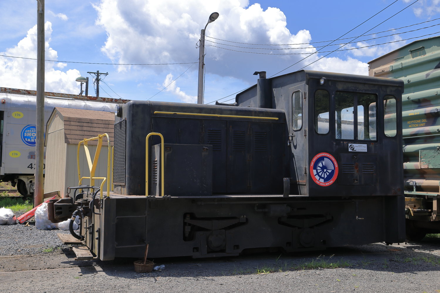This locomotive, built in 1955 for Orange and Rockland Power Company (O&R), went through several owners before being donated to Operation Toy Train in October of 2021 for use as a Port Jervis yard switcher. Its small size means that it will fit on the 115-foot-long turntable with any other piece of rail equipment in the collection. The locomotive was donated to the Port Jervis Transportation History Center in February of 2022. The engine will be restored to its appearance in the O&R days, representing the presence of a significant Port Jervis industry.